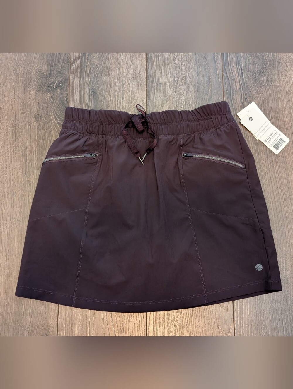 Apana Performance Mini Skort in Deep Plum